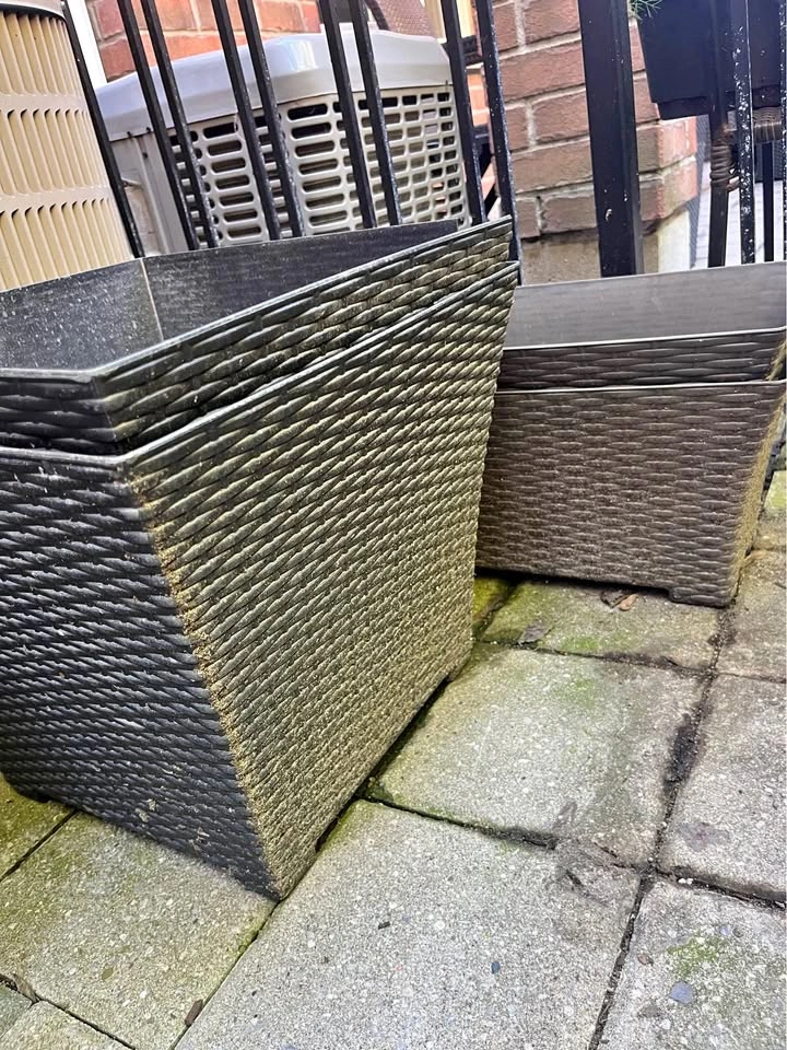 4 Dark Plastic Planters