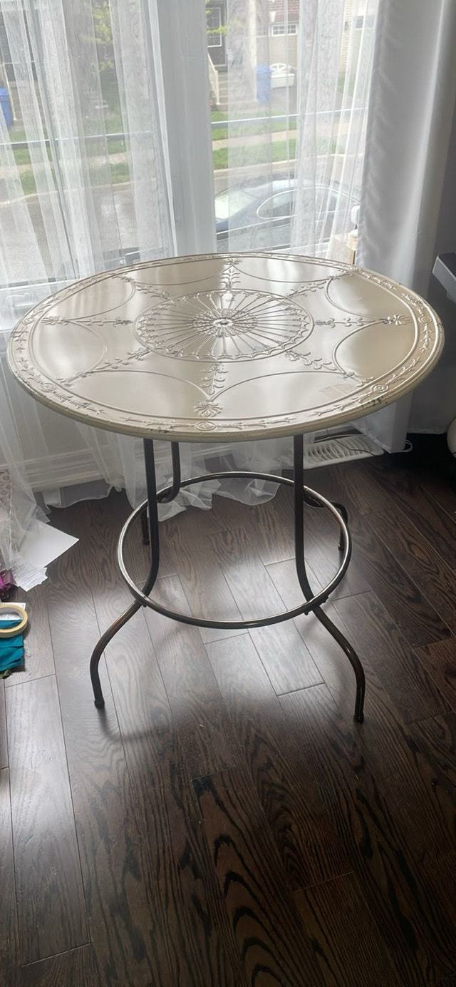 Rustic round table with metal top