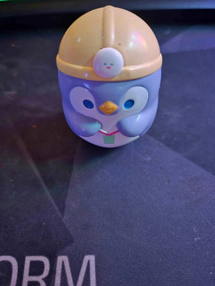 Penguin toy with hard hat