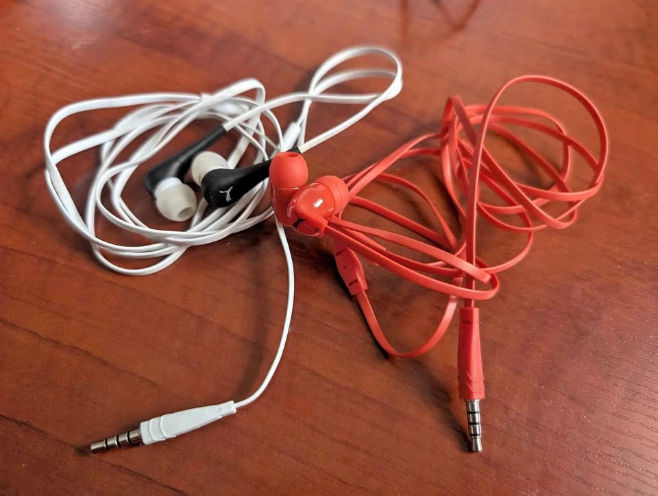 Two Puma Earbuds with Headphone Jack