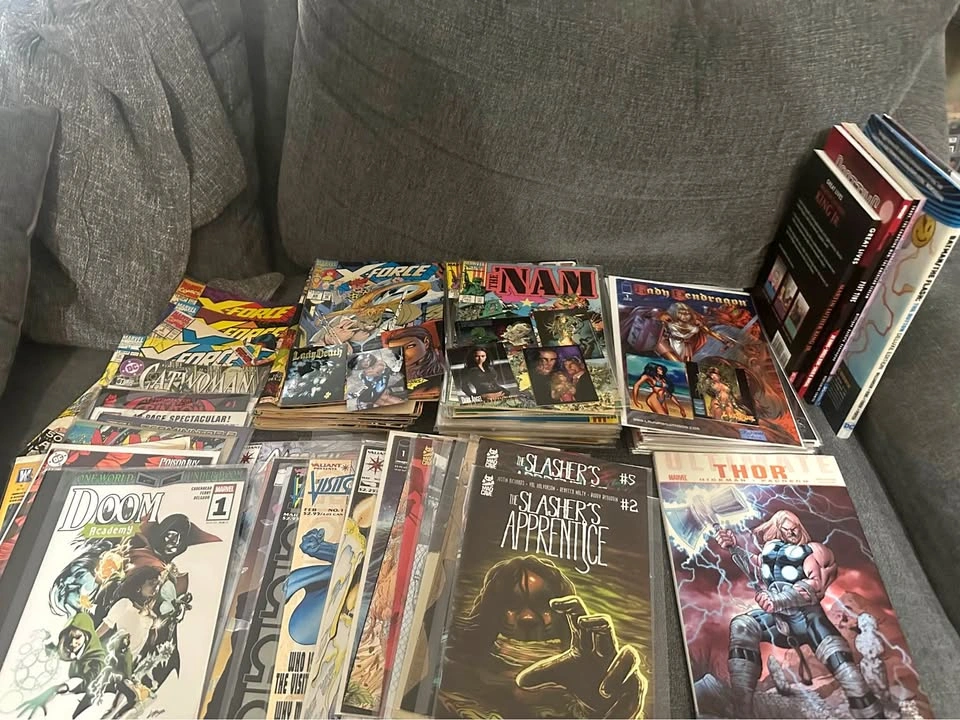 About 100 comics and some comic cards