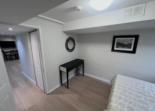 Furnished 1 Bed Basement Apt near SQ One - photo 2