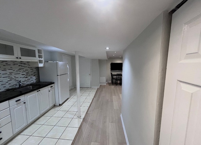 Furnished 1 Bed Basement Apt near SQ One - photo 3