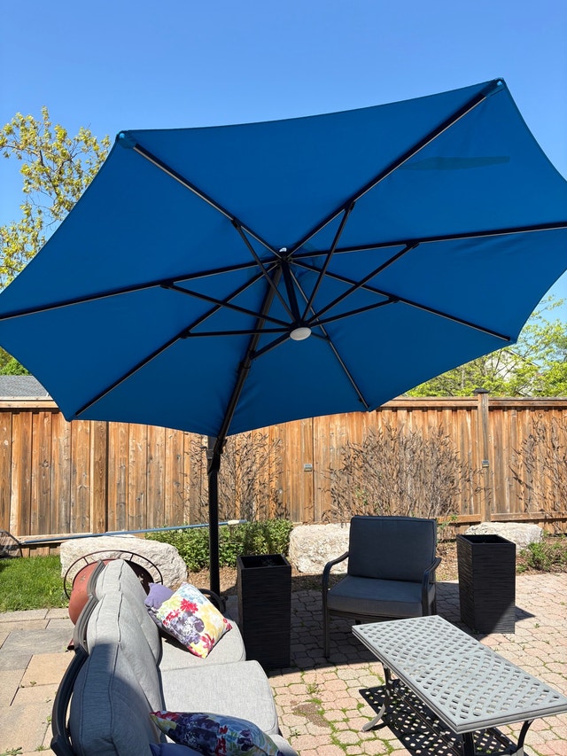 Blue Cantilever Patio Umbrella with Stone Base