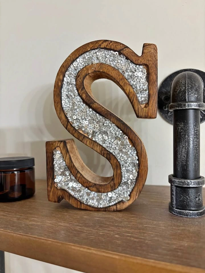 Decorative wooden letter S with sequins