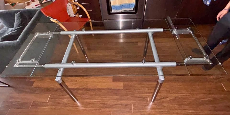 Glass top extendable dining table