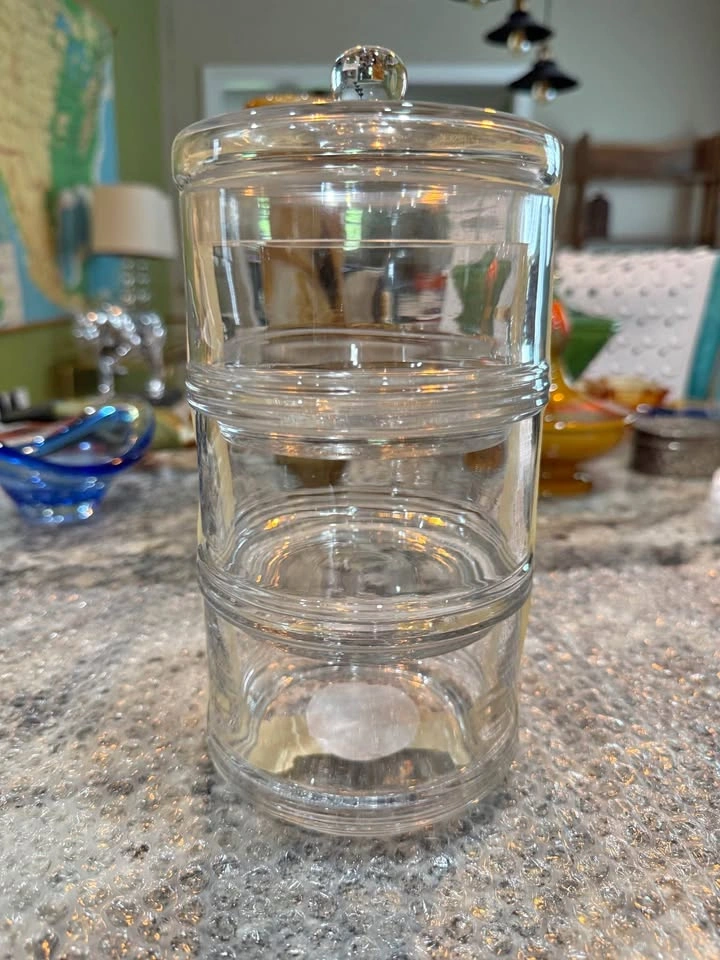 3 Tiered Glass container with lid.