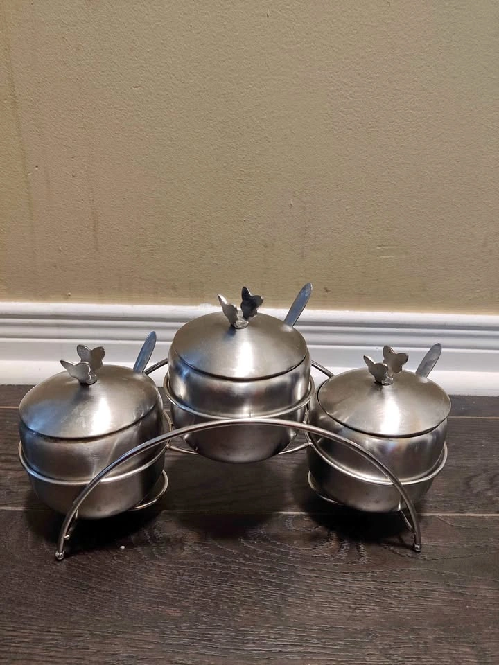 Used stainless steel seasoning containers set