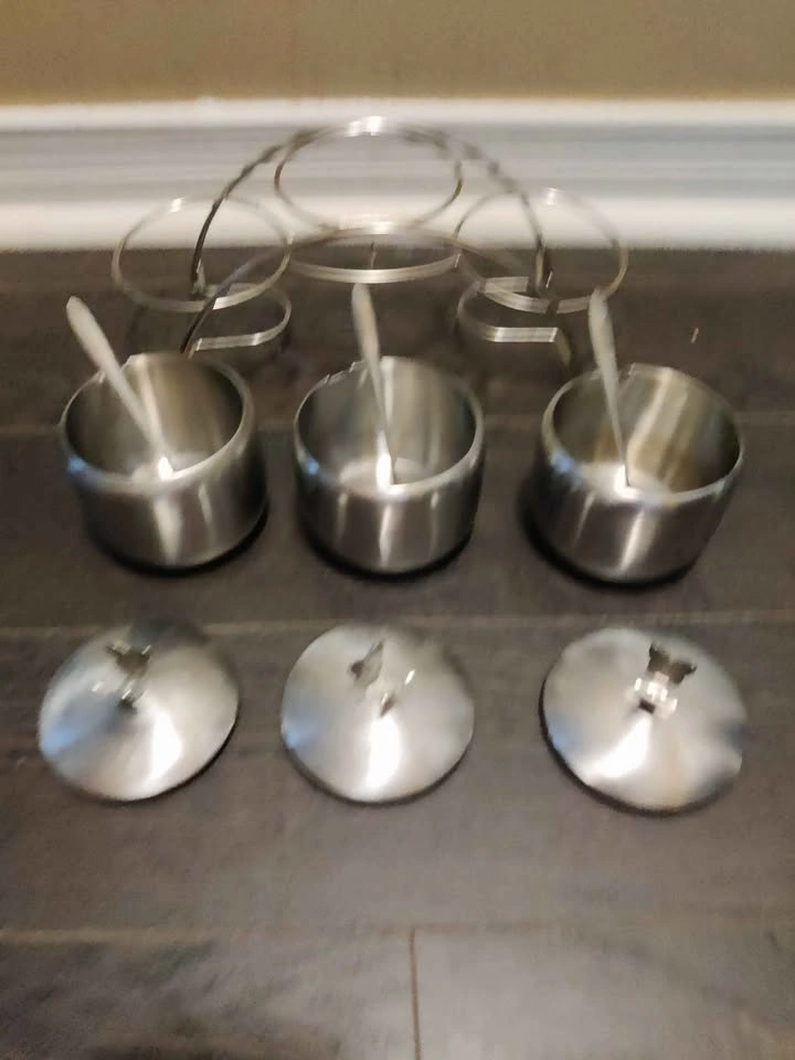 Used stainless steel seasoning containers set - photo 4