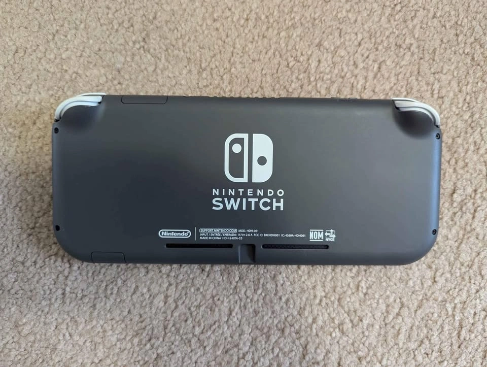 Nintendo Switch Lite with up to 30 Games - photo 2