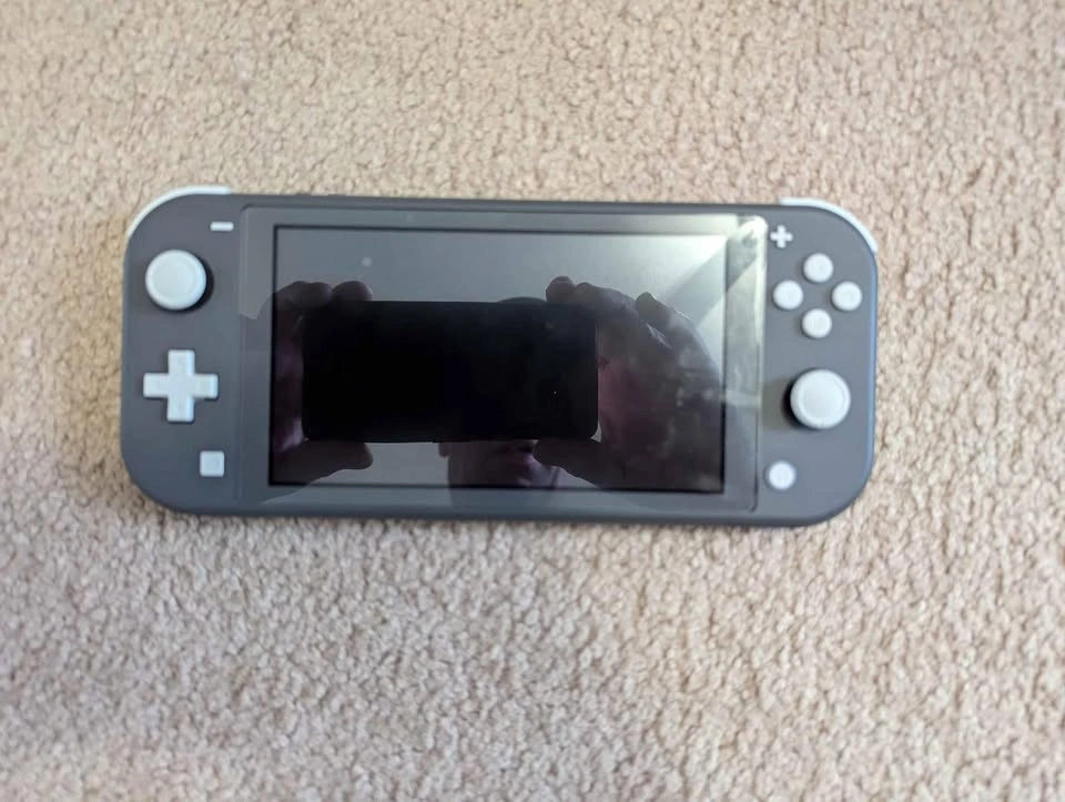 Nintendo Switch Lite with up to 30 Games - photo 4