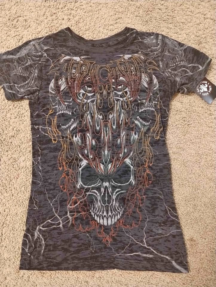 Score iconic band tees from Zumiez and Affliction! 🌟 Brand new