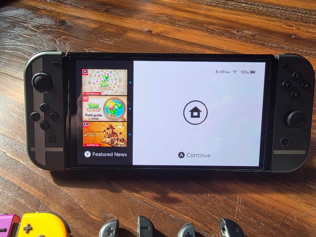 Nintendo Switch OLED Bundle - photo 2