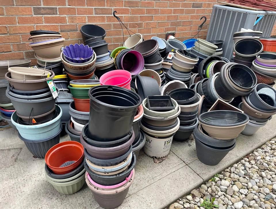 $1 each - plastic planters most around 10-12” wide