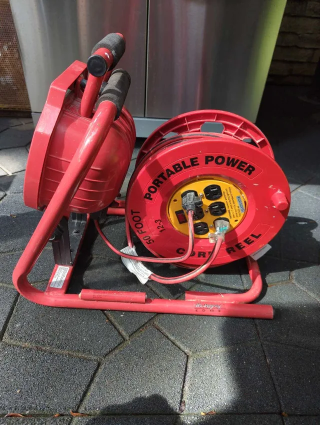 Portable power cord reel with light thumbnail