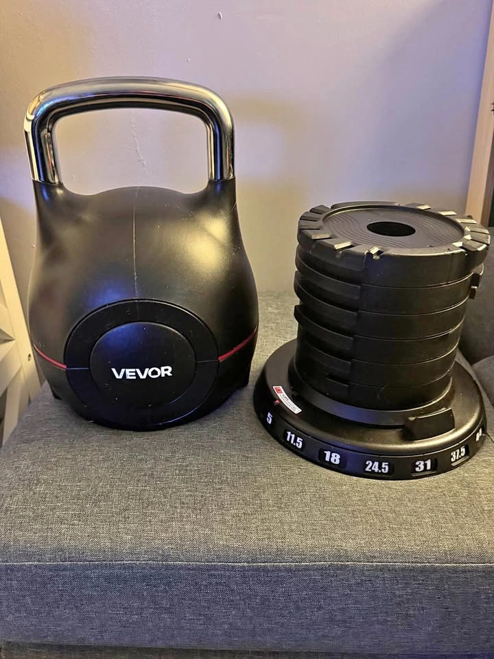 Adjustable Kettle Bell 5lbs to 44lbs. Practically New!