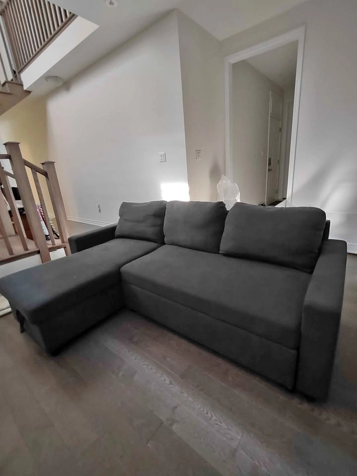 Wyan Reversible Sleeper Sectional - Dark Grey