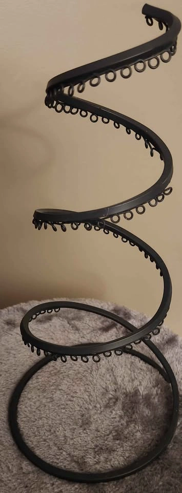 Black spiral earring holder