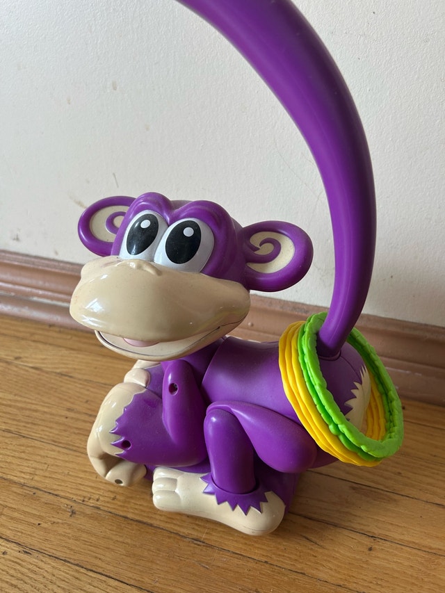 Battery-Operated Monkey Ring Toss Toy