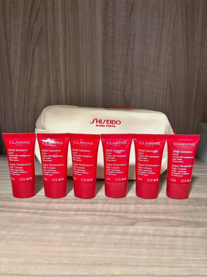 Clarins Super Restorative Day Cream 90ml + Shiseido Bag