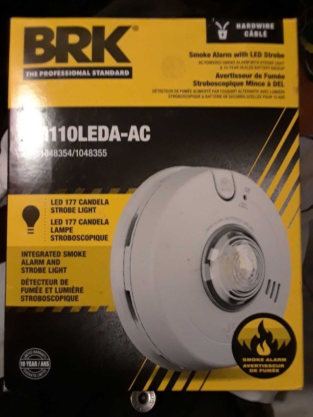 Brand new smoke alarm with LED strobe