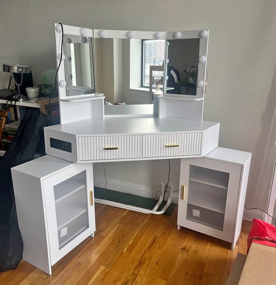 Vanity for make up and toiletries with lights, outlets