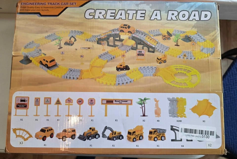 New, 200 tracks, 2 cars, 4 trucks included in box. - photo 2