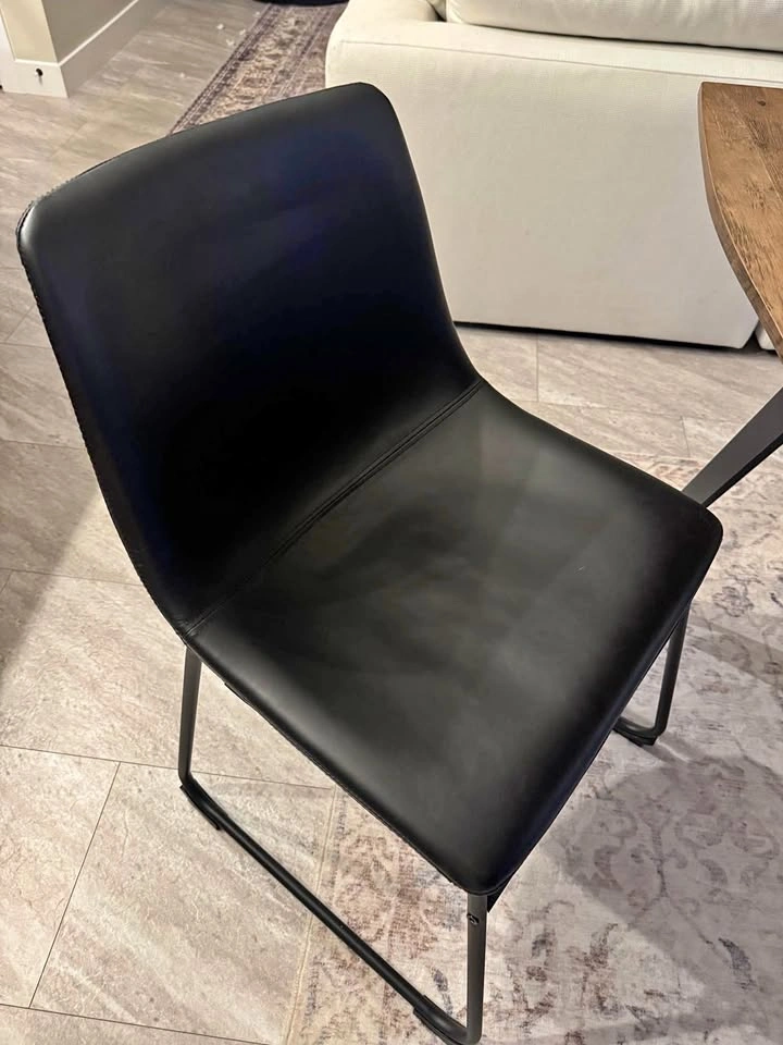 Black leather dining chairs like new