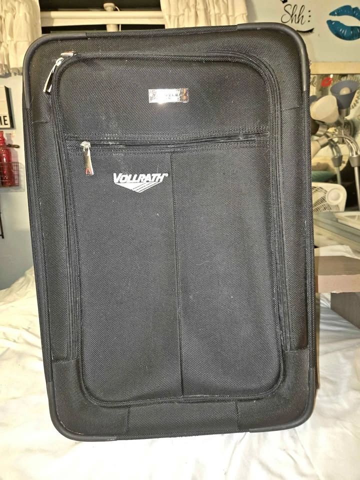 Vollrath Black Rolling Suitcase