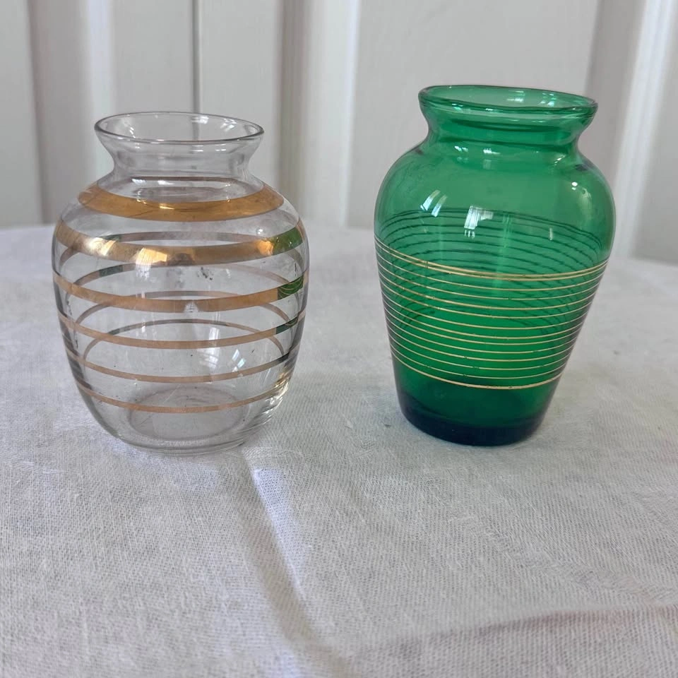 Cute set of two small gold leafed bud vases.
