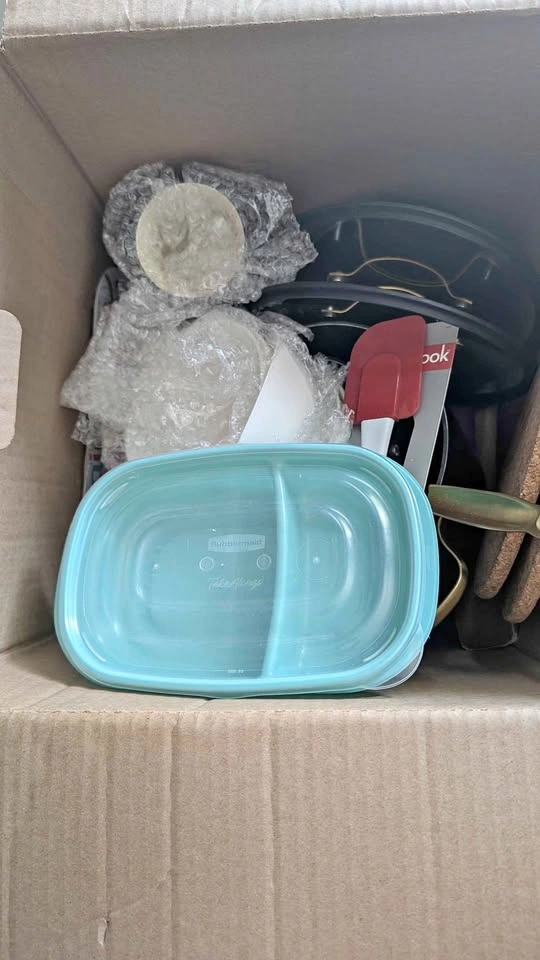 Boxes of kitchen items and tools