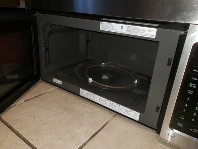 NEW LG Over-the-Range Microwave - photo 2