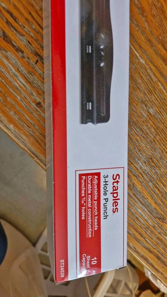 Three hole punch