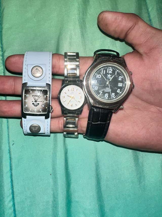three watches not fixed getting rid of all for 15$