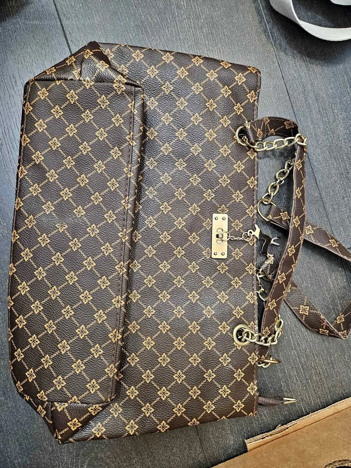 Brown patterned handbag with gold chain strap