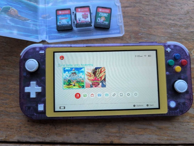 Nintendo Switch Lite with 3 Games - photo 3