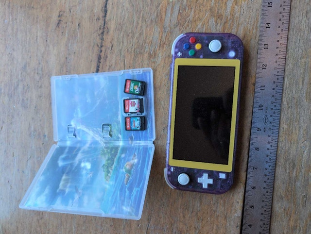 Nintendo Switch Lite with 3 Games - photo 5