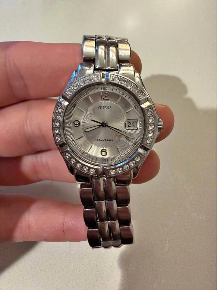 GUESS Women’s Silver Tone Crystal Bezel Watch Date Quartz 100M