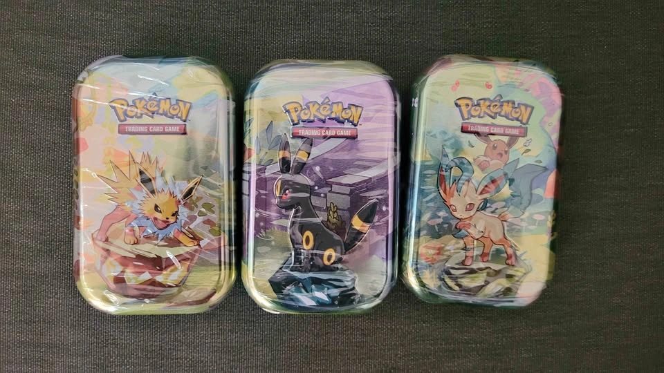 Pokemon Prismatic Tins