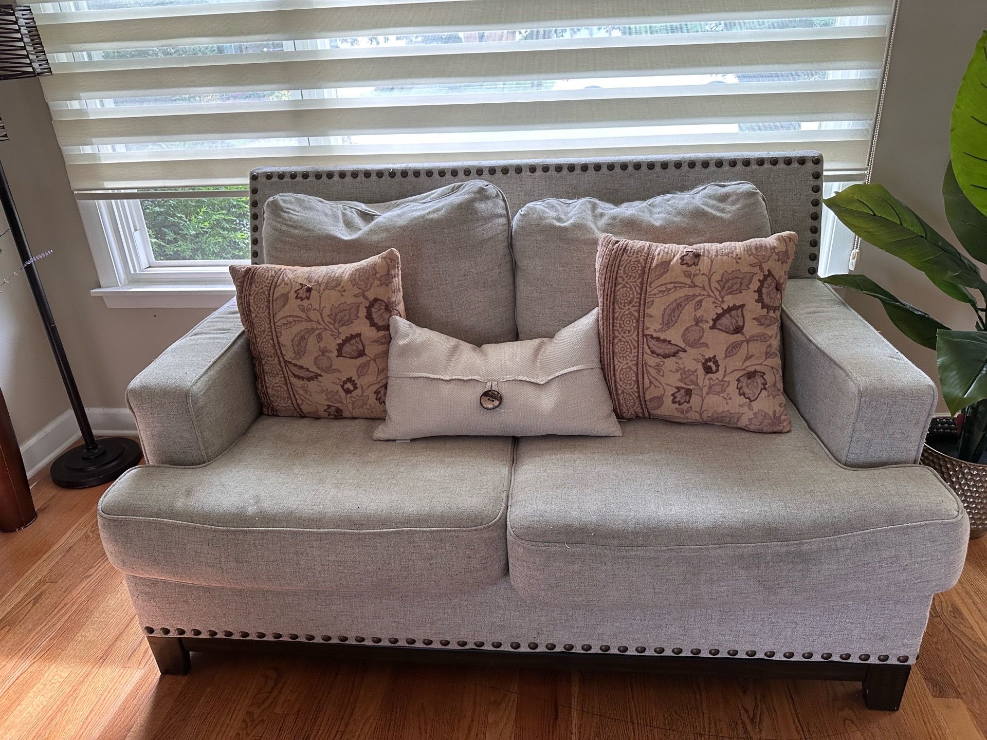 Beige couches with studded trim - photo 2