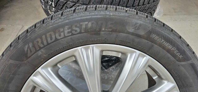 4 Bridgestone All-Season Tires 235/50 R18 with Ford Rims - photo 4