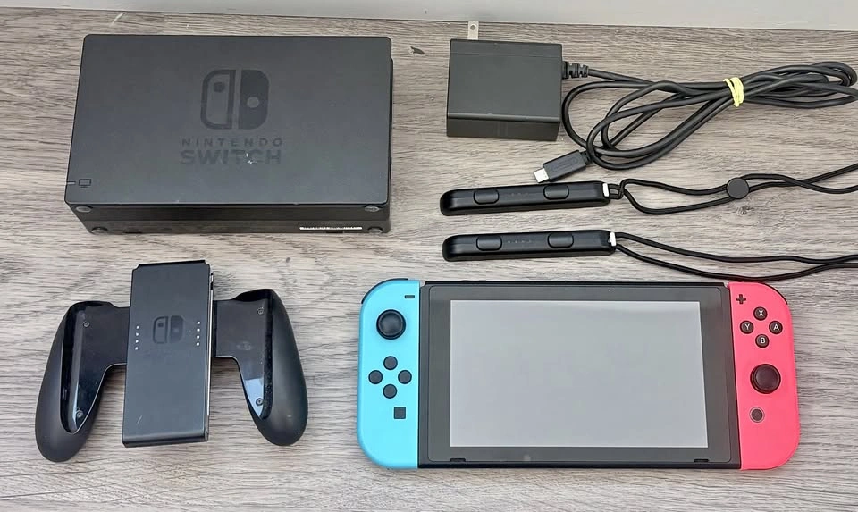 Nintendo Switch Console with Blue and Red Joy-Con + Pokemon Case