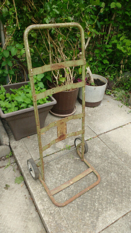 Vintage outdoor tools and dolley