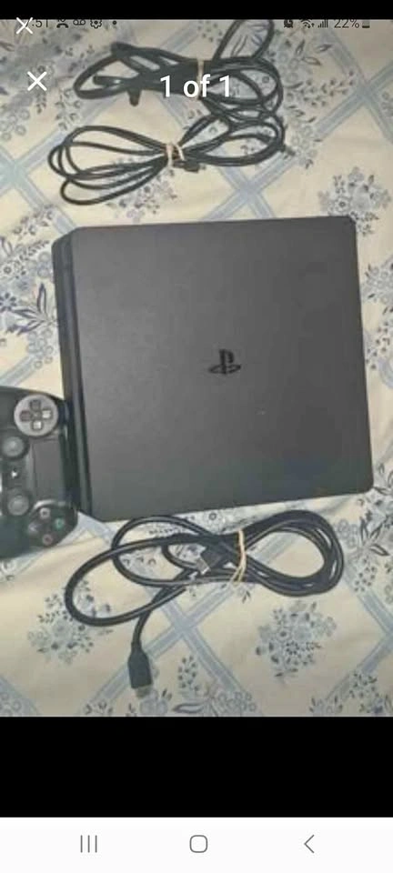 PlayStation 4 Slim Console with Controller and Cables