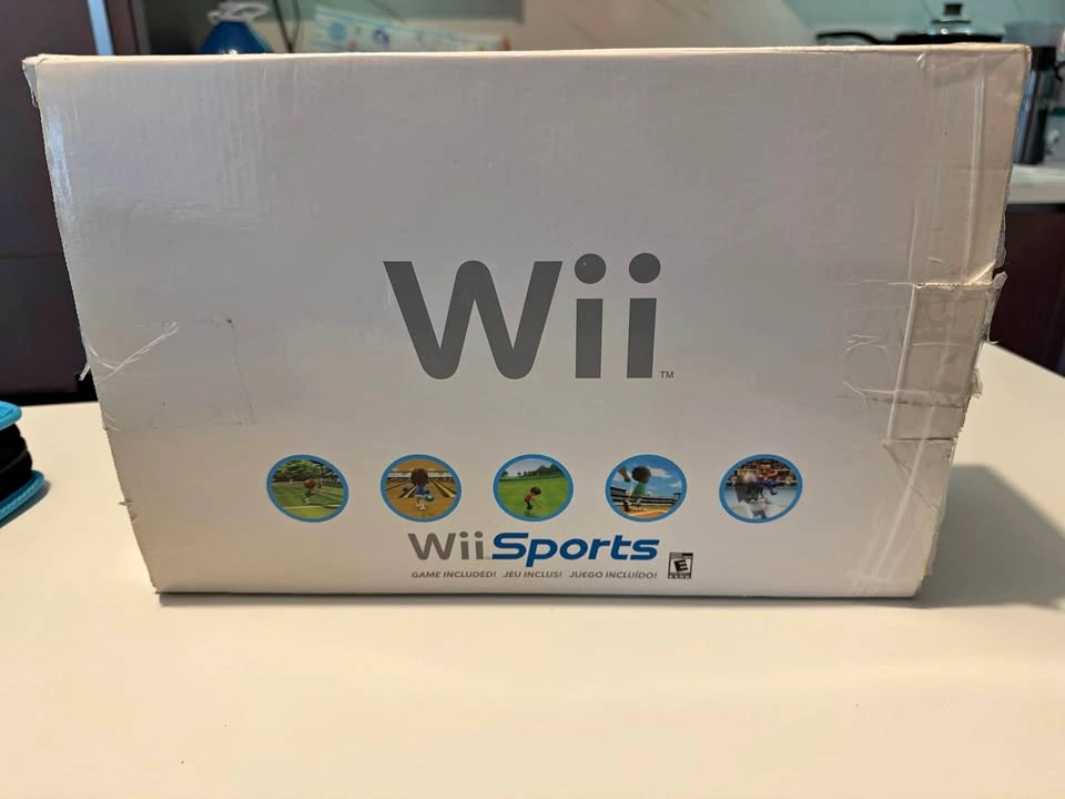 Nintendo Wii + Wii Sport + extra remote + Super Mario Galaxy