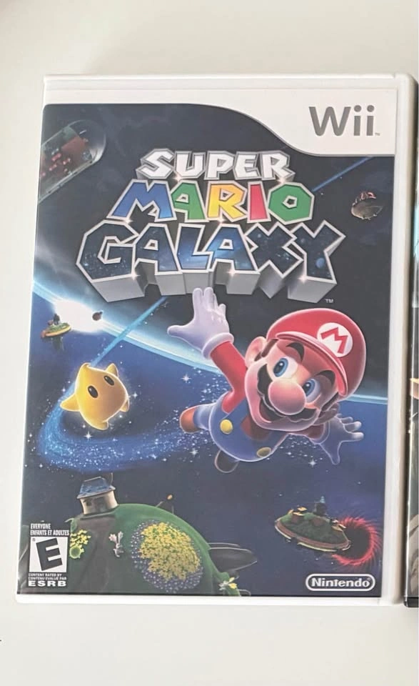 Nintendo Wii + Wii Sport + extra remote + Super Mario Galaxy - photo 4