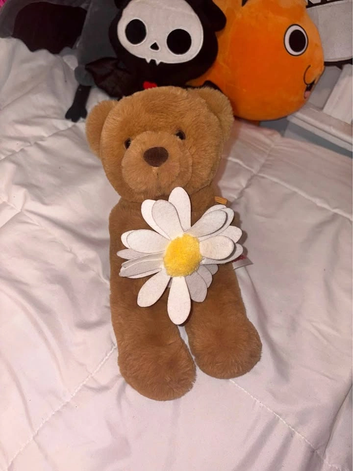 teddy bear with flower