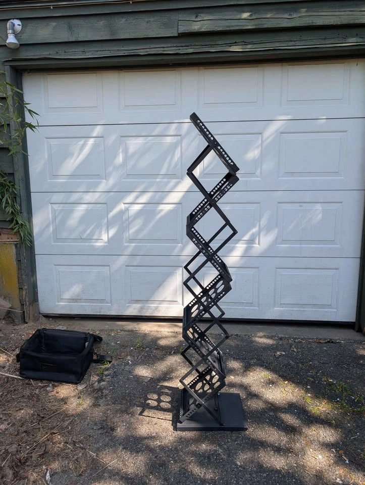 Magazine rack 6 tier collapsible comes with bag retails $200+ - photo 3