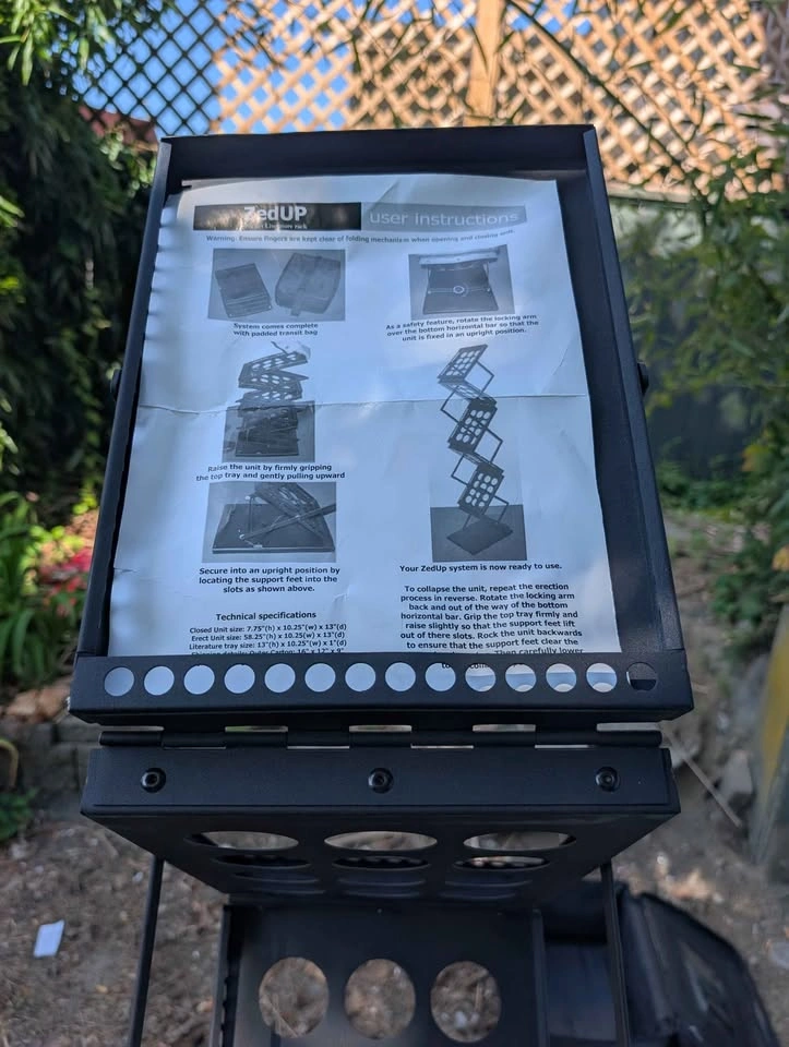 Magazine rack 6 tier collapsible comes with bag retails $200+ - photo 5
