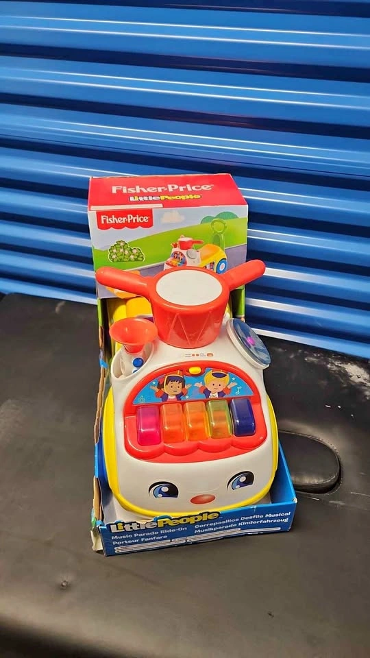 Fisher-Price Kids Music Parade Ride-On Car